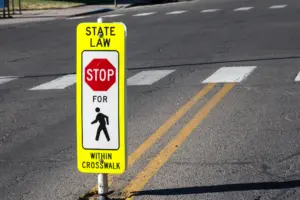 A shot of crosswalking sign rule.